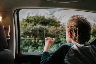 Why Does Driving With a Car’s Rear Windows Down Hurt Your Ears?