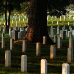 Why Do People Leave Coins on Gravestones?
