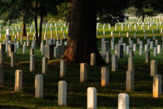 Why Do People Leave Coins on Gravestones?