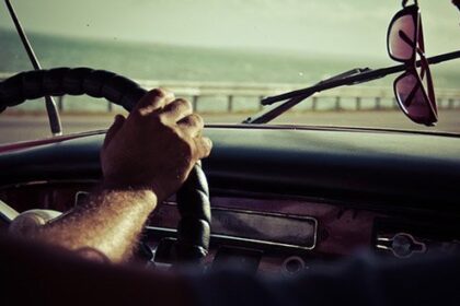 How can you get a tan through glass if it blocks all UV rays?